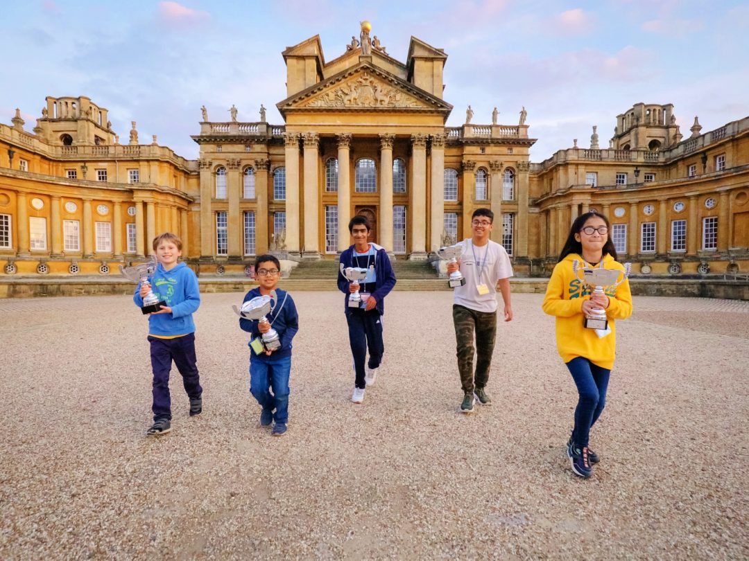 L to R age group winners Frederick Gordon, Keerthi Kumar Advait, Balaji Aaravamudhan, Rajat Makkar and Elis Denele Dicen in the Great Court at Blenheim Palace