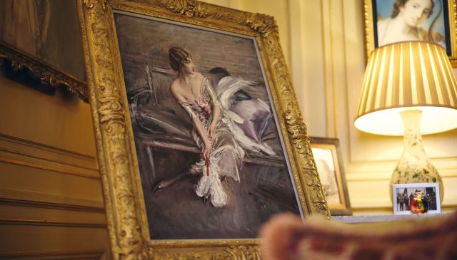 Giovanni Boldini's portrait of Gladys, Duchess of Marlborough, in its gilt frame in a Palace room
