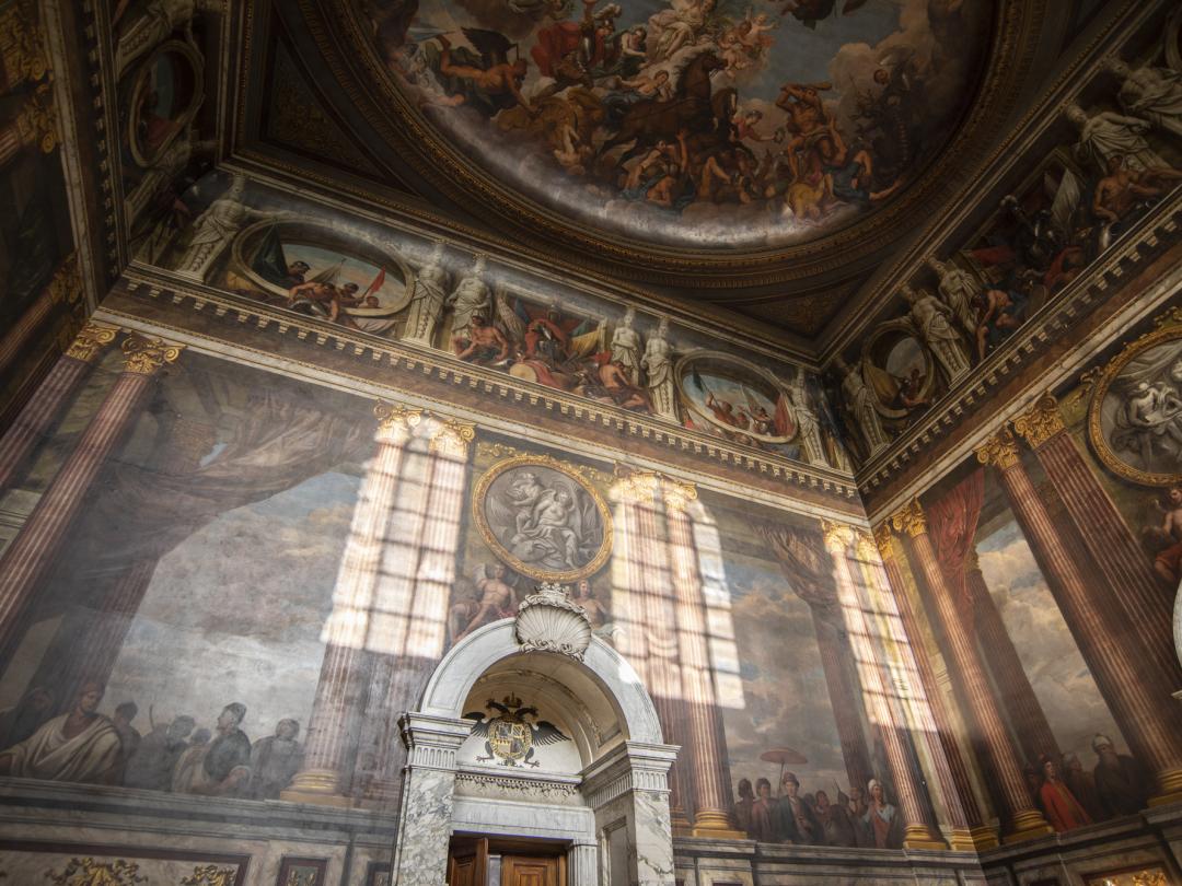 The Saloon at Blenheim Palace, with Louis Laguerre's painted walls and ceiling above a marble doorcase