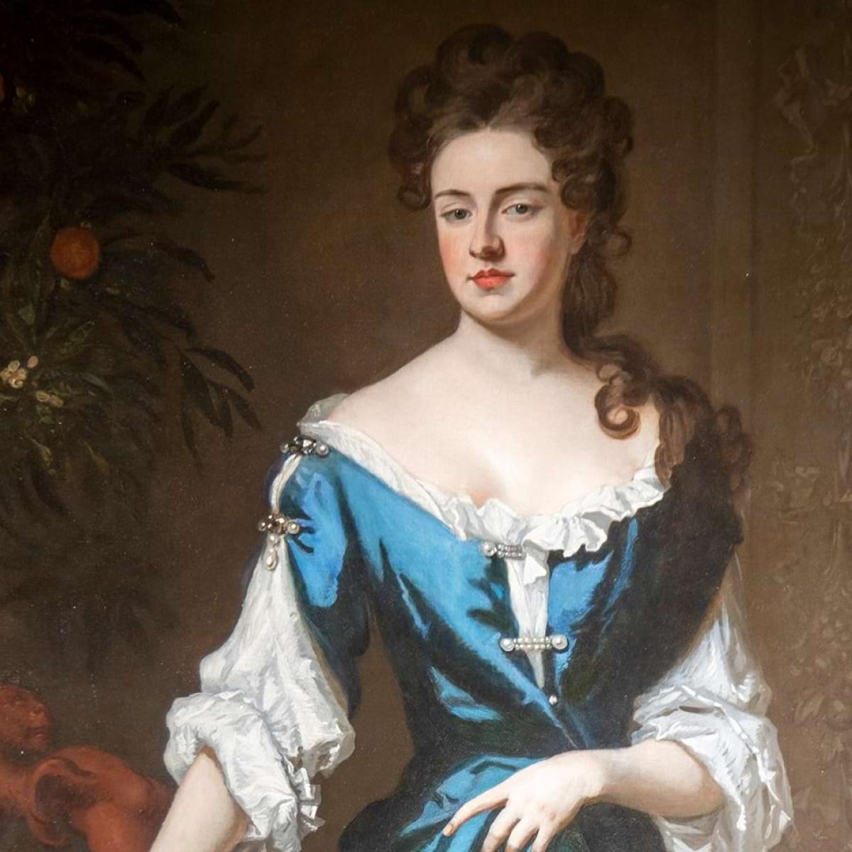A portrait of Sarah, 1st Duchess of Marlborough, in a blue gown beside an orange tree in fruit
