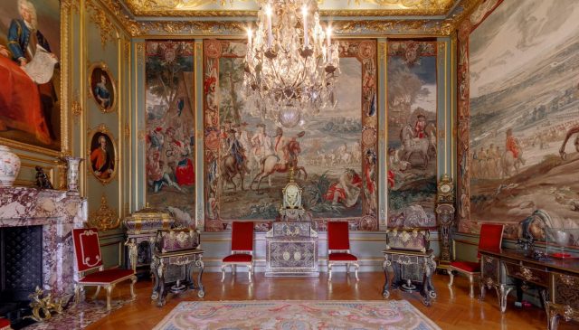 The Third State Room, hung with the Marlborough tapestries and furnished with red and gilt chairs